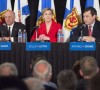 Plastic water bottles lined up in front of Conservative leadership candidates at a Feb. 4 debate in Halifax