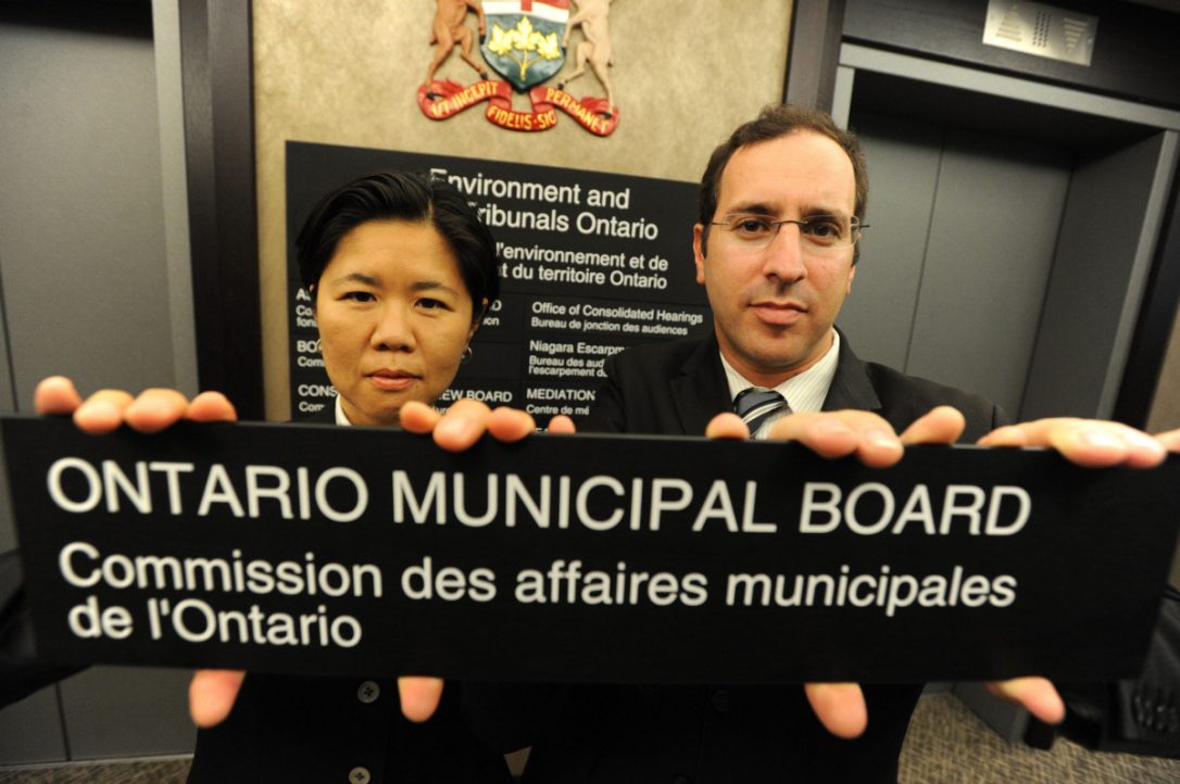 Toronto city councillors Josh Matlow, right, and Kristyn Wong-Tam, pictured in May 2012, tried to remove Toronto from the jurisdiction of the Ontario Municipal Board -Toronto Star photo