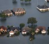 ‘The swamps and wetlands that once characterized Houston’s hinterland have been replaced with strip malls and suburban tract homes.’ Photograph: Gerald Herbert/AP